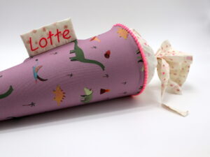 Schultüte "Dinos mauve" mit Namen